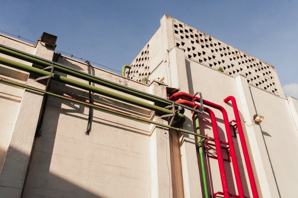 A building’s exterior with pipes 